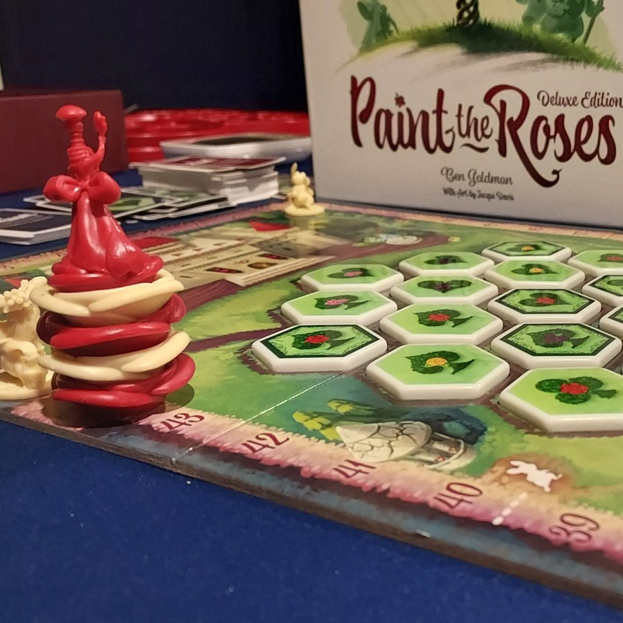 Painting the Roses Red – We’re Painting the Roses Red – We Dare Not Stop – Or Waste a Drop – So Let the Paint Be&nbsp;Spread